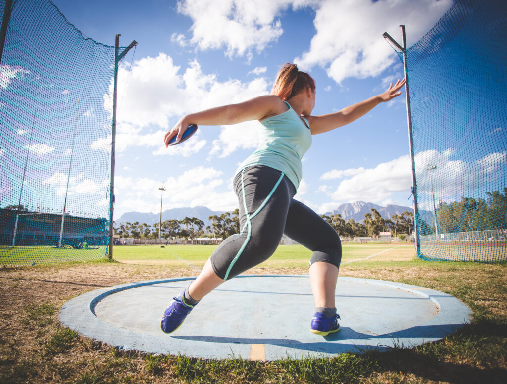 Female Athlete Throwing Discus